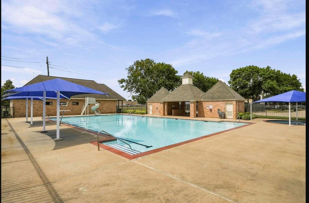 Community pool amenity in a Sugar Land neighborhood, a selling point when listing a home